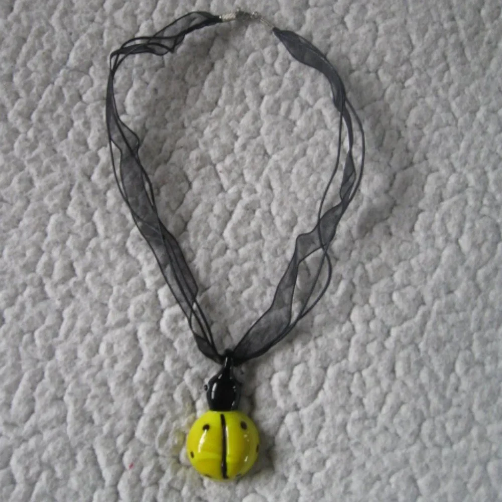 5/$20 Girls Yellow Ladybug Necklace